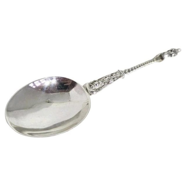A fine edwardian sterling silver apostle spoon dating to 1904, displaying the traditional figural decoration associated...