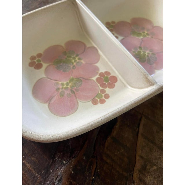 Lovely English stoneware divided serving dish by Denby, presented in a soft taupe Glaze, with large blooms across the...