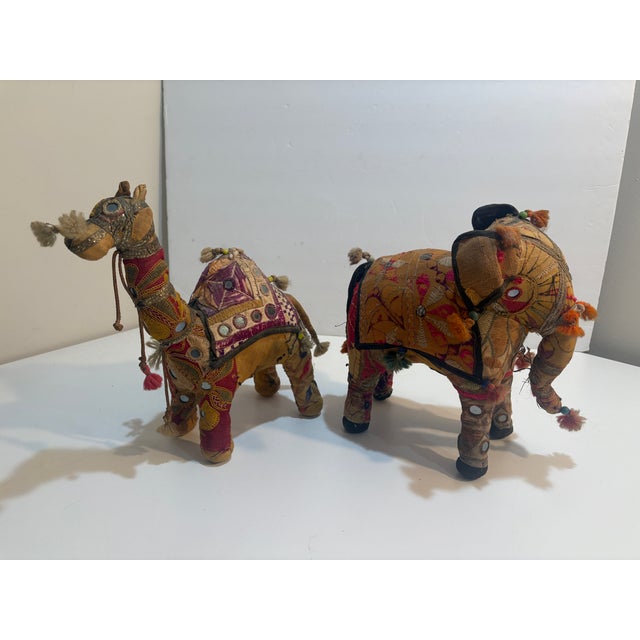 This exceptional mid-century elephant and camel were handcrafted in India with intricate hand embroidery, traditional...