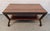 Striking vintage Mid-Century Modern coffee table crafted from stunning Macassar ebony. Renowned for its dramatic dark...