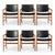 This exceptional and rare set of six Danish Modern Model JH507 dining armchairs attributed to Hans J. Wegner and produced...