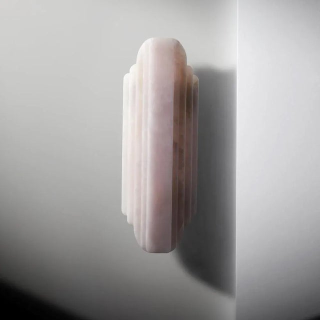 Walljewel by Lisette Rützou Dimensions: 15 x H 42 cm Materials: Rose, green and white onyx.
