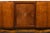 A striking French Art Deco sideboard sourced in Paris, France, dating to the 1930s. Crafted in richly figured walnut...
