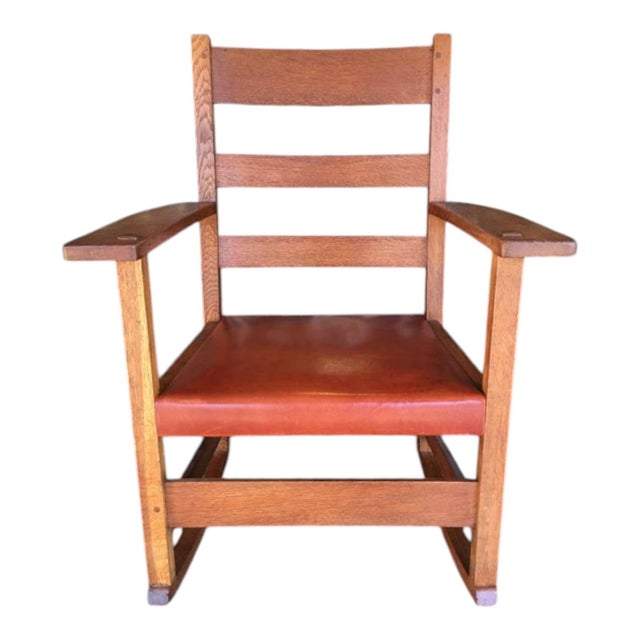 Beautiful L & J. G. Stickley Oak Rocking Chair With Cognac Saddle Leather Covered Seat, Circa 1912-1920 retaining the...