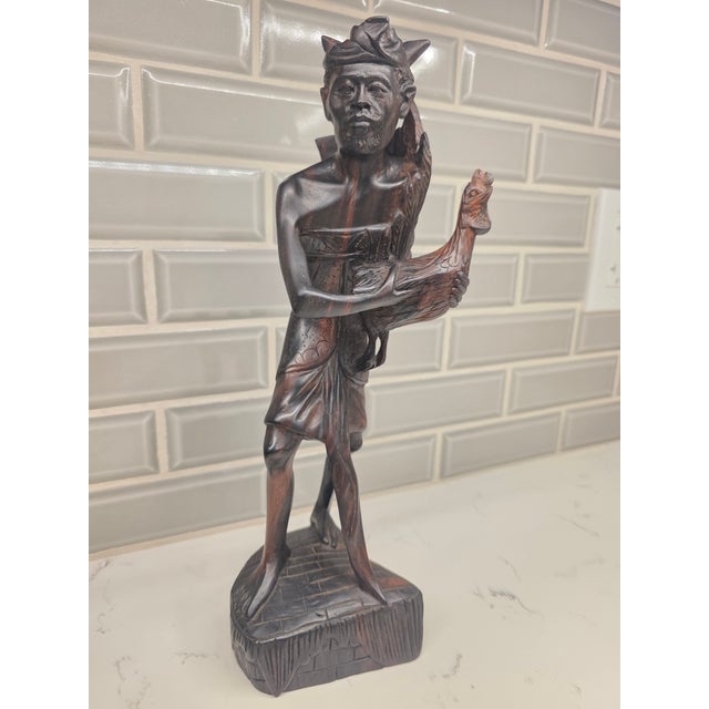 An exceptional and expressive milestone of mid-century Indonesian art, this 12.5-inch sculpture captures the absolute peak...