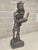 An exceptional and expressive milestone of mid-century Indonesian art, this 12.5-inch sculpture captures the absolute peak...