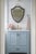 A refined and timeless Bombay Company shield‑form mirror, featuring a rich dark Cherry or Mahogany frame and a crisp...