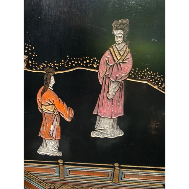 48x48 inch black lacquered wall art Depicting life in early China Very good condition. In Chinoiserie style. Beautiful piece