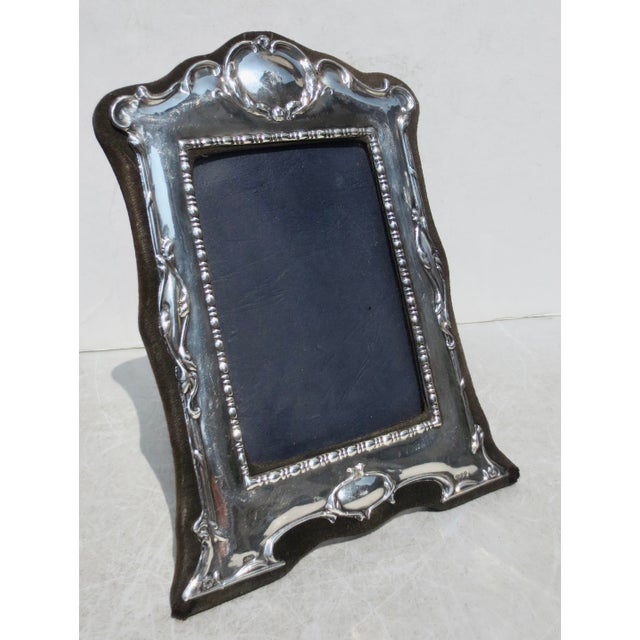 Edwardian-style silver frame with velvet back and stand. Glass face vintage United Kingdom circa 1990s. Refined style with...
