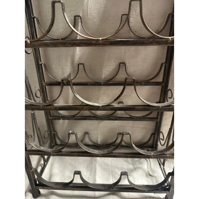 This is a unique vintage piece. It is foldable. It would be a perfect addition to any bar or dining area.