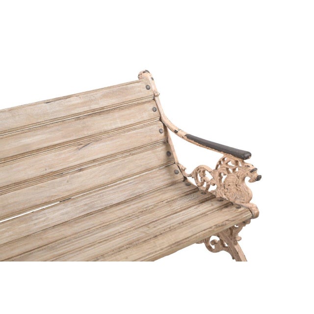 This Vintage Anglo-Indian Painted Teakwood and Cast-Iron Garden Bench is a timeless outdoor classic featuring elegantly...