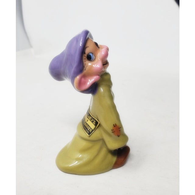 Here is a Hagen Renaker Disney Dopey figurine made 1955 - 1960. This 3-1/4" tall figurine features Dopey from the Snow...