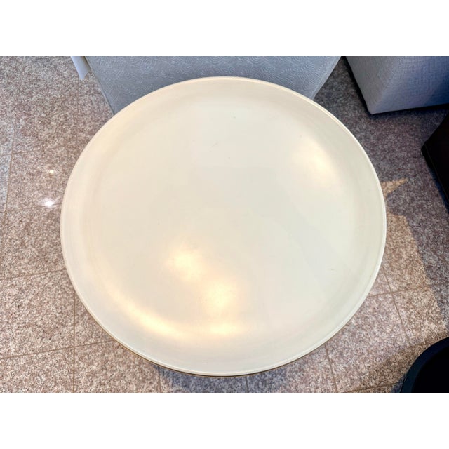 Barbara Barry’s Oberon side table brings soft modern glamour to any space. Its round pearl-lacquer top and slim brass...