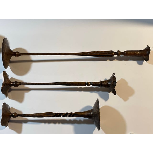 Stately and gorgeous hand-forged copper candle holders from Hessel Studios. Set of three. Each candlestick design is...