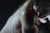 Contemporary Nomos by Christopher Remmers | Oil on ACM panel figure holding a glowing heart in a dark setting For Sale - Image 3 of 3