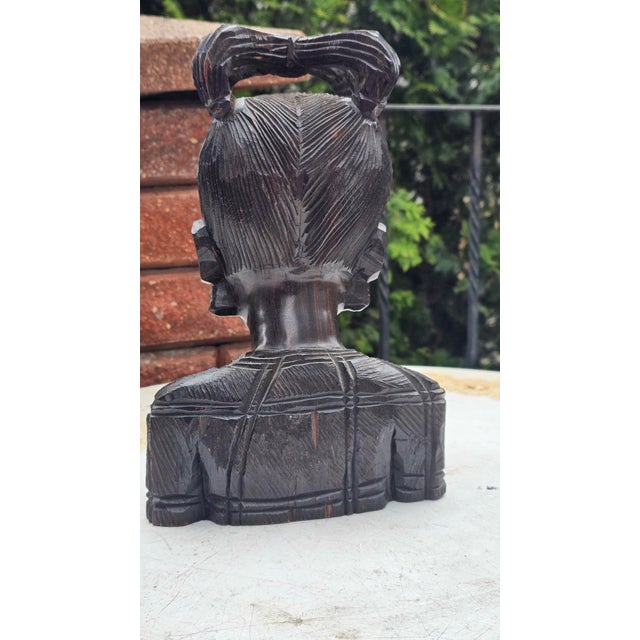 Wooden figurine sculpture, bust of an African woman, ebony, height 29 cm, width 19 cm, depth 12.5 cm.