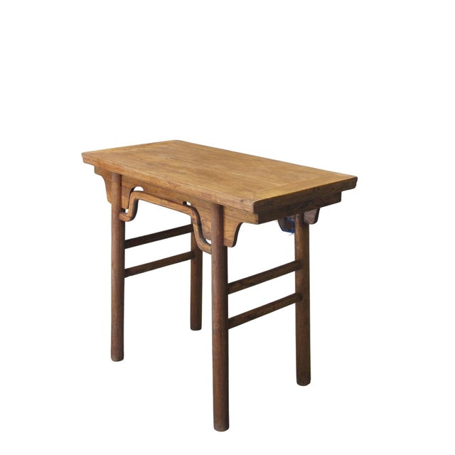 Constructed from solid elm wood, this altar table features a rectangular top with subtle everted flanges and a flush-panel...