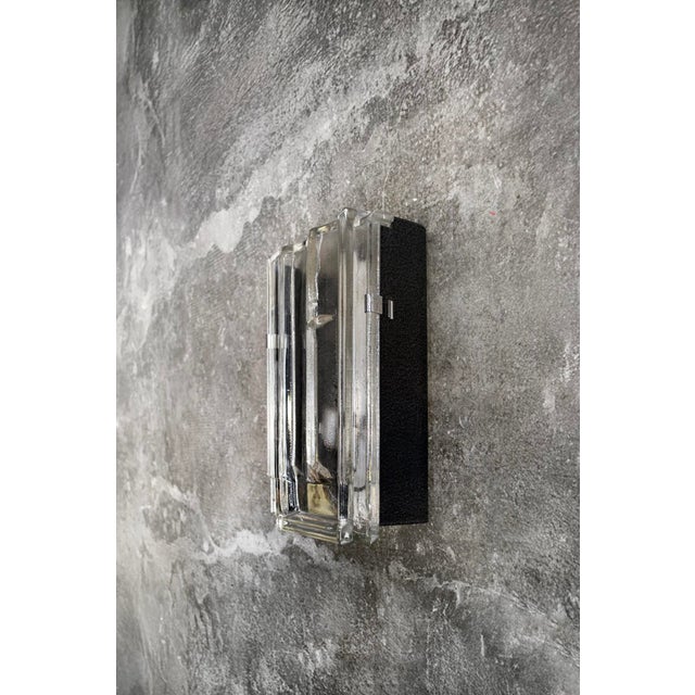 Rare glass wall lamp with metal frame. Manufacturer: Fontana Arte. 1970s I have official proof of authenticity such as...