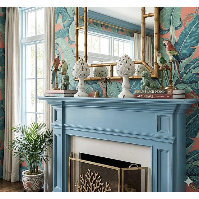 Offering a pair of Late 20th Century white distressed composite resin painted artichokes on pedestals, giving them a...