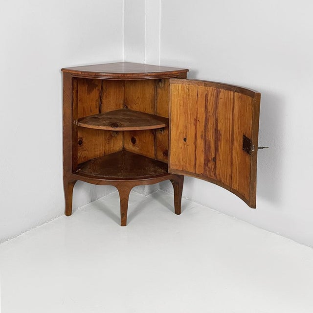 English 19th century style corner console in inlaid wood, 1940s Corner console table made entirely of inlaid wood. The...