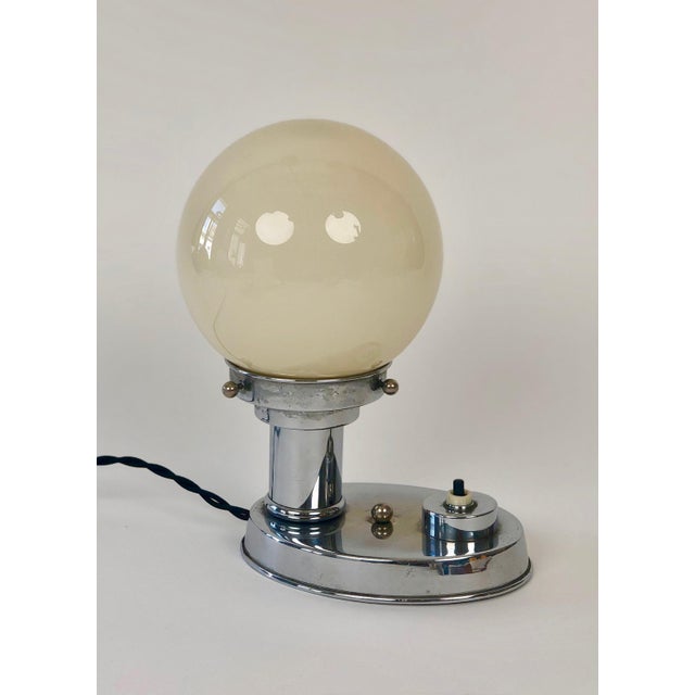 A pair of chrome plated Art Deco table lamps from the 1930's. The chrome on both lamps is in very good original condition;...