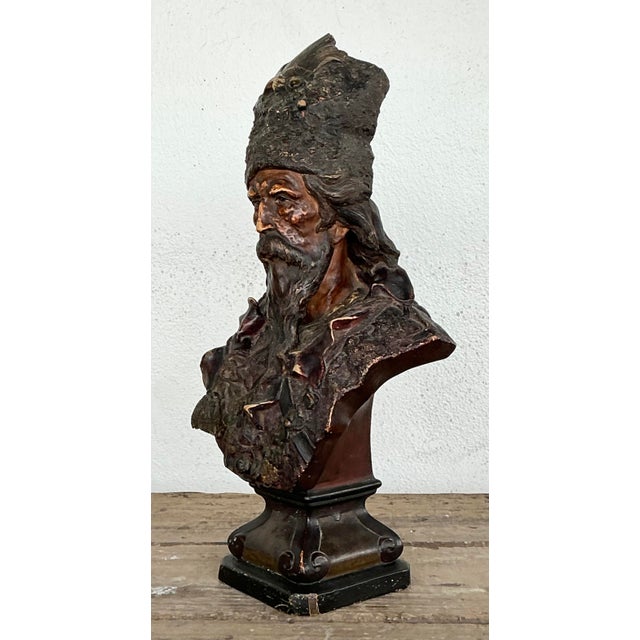 This striking vintage portrait bust captures the rugged character and dignified presence of a historical patriarch, likely...