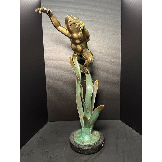 The is a rare limited edition G. Mancini bronze frog sculpture, titled "Leap of Faith" and numbered 34 out of 300. This...