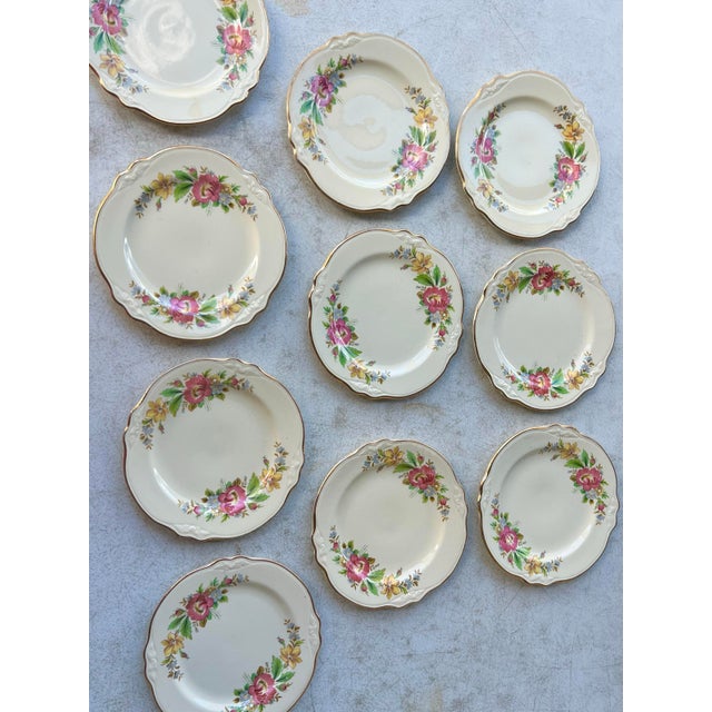 Add a touch of sweet, mid-century cottage charm to your next table setting with this gorgeous, matching set of 10 bread...