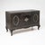 An elegant sideboard from the 1930s, featuring an anthracite finish. The front is adorned with silver-patinated oval...