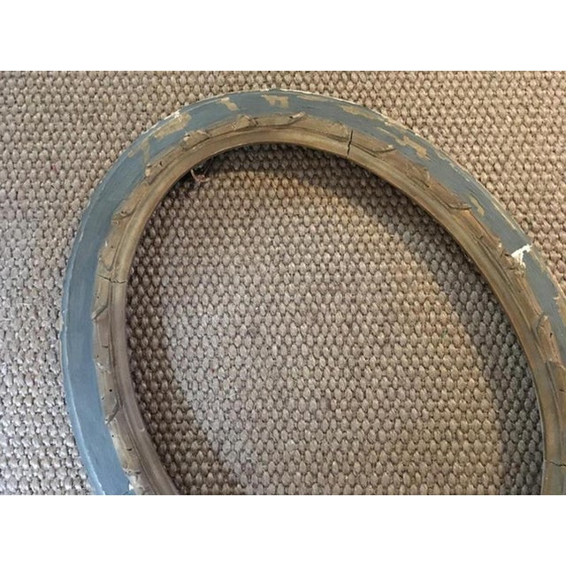 This is an elegant wood frame, lacquered in the green typical color in Venice in 18th Century. The thick hand carved...