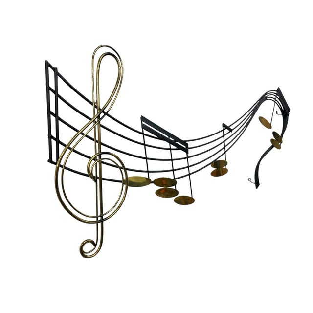 The Vintage Curtis Jere 41" Rhapsody Musical Wall Sculpture, signed by the artist in 1991, is a large iron and metal...