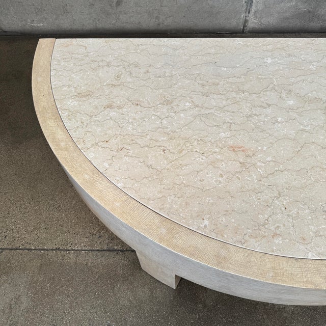 Elevate your living space with this striking half-moon coffee table by premier Los Angeles designer Gina B Furniture....