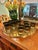 Cera barware was made popular in the Mid Century with its gold detail and colorful patterns. “Golden Grapes Green” is...
