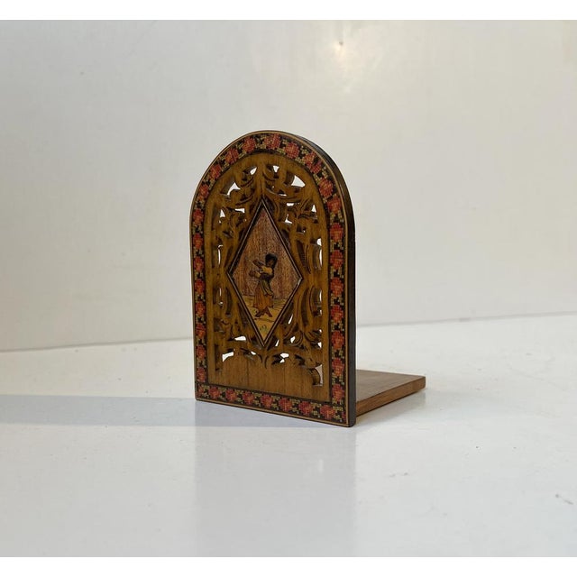 Hand-crafted Italian Bookend featuring an exotic Dancer framed with ornate floral perforations and a micro-mosaic wood...