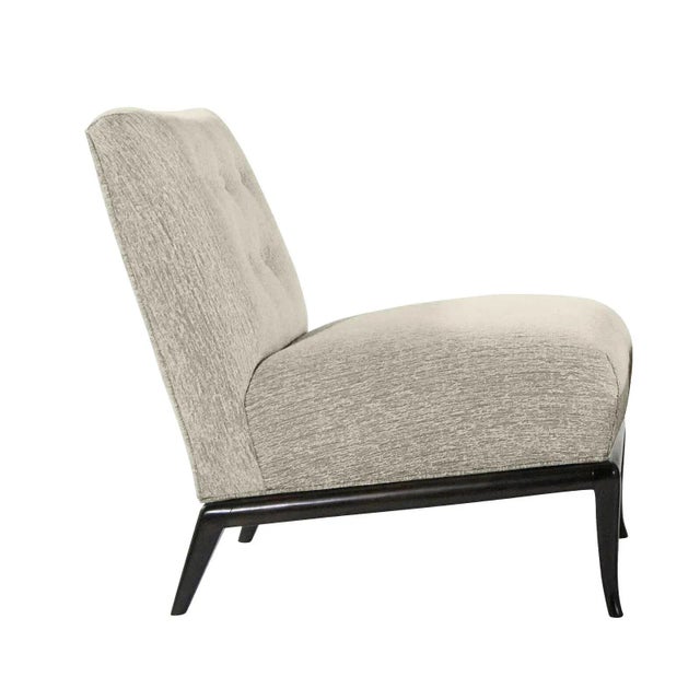 Modern mid century style slipper lounge chairs. The chairs are in the manner of Robsjon Gibbings. The frames are done in a...