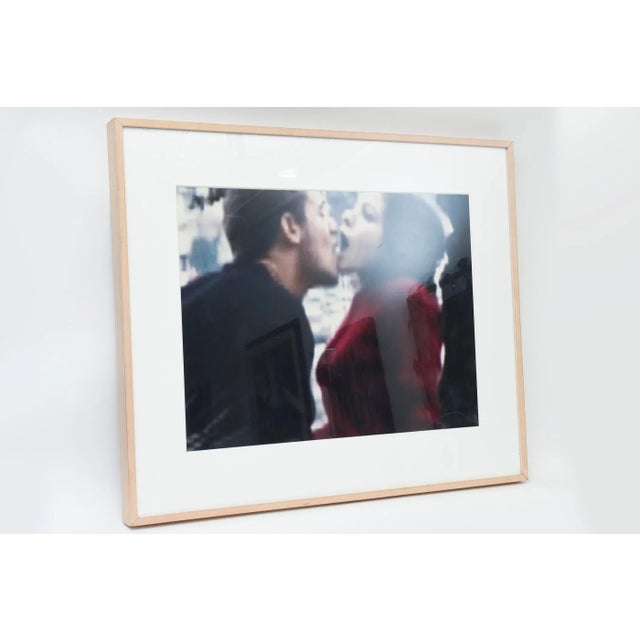 This very provacative romantic.photograph that is a chromogenic print on Fugi Crystal Archive paper is by the noted multi...