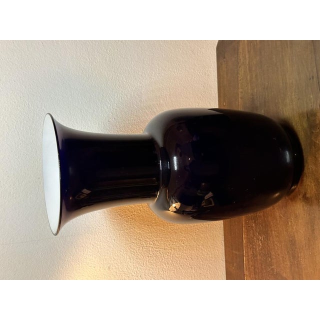 This Opalini glass vase is made of blown and handcrafted glass. Unique and unrepeatable work, with a pure and essential...