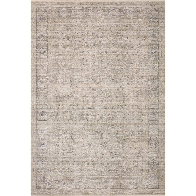 Area rugs in the Alie Collection have an elevated antique look and plush, modern feel. The rug’s underlying traditional...