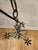 10 ft plug in Brass antique gold rubbed finish 3 Plastic faux candle drips light bulb holders 12inches wide x 18 inches...