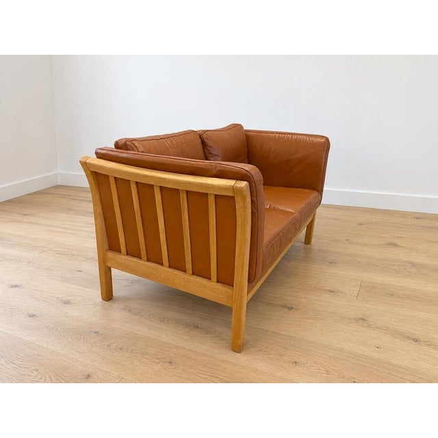 Vintage Danish Two Seater Sofa in Cognac Leather with Oak Frame For Sale - Image 3 of 11