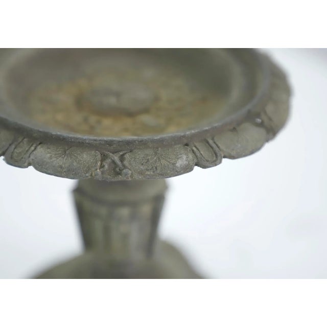 French antique metal oil lamp stand with ornate detailing. It is stamped on the bottom. This is patinaed, but it is in...