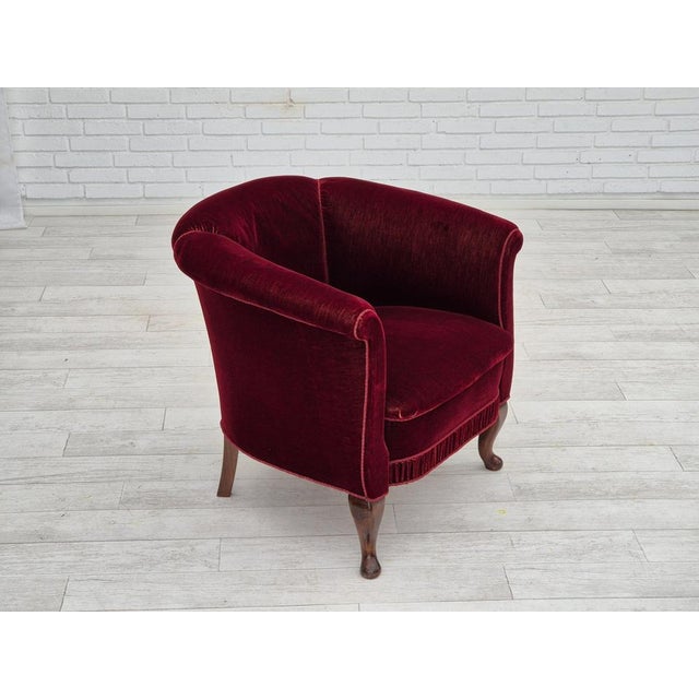 1960s, Danish lounge chair in cherry-red furniture velour. Original very good condition: no smells and no stains. Beech...