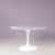 This elegant marble dining table was designed by the renowned finnish-american designer eero saarinen and produced by...