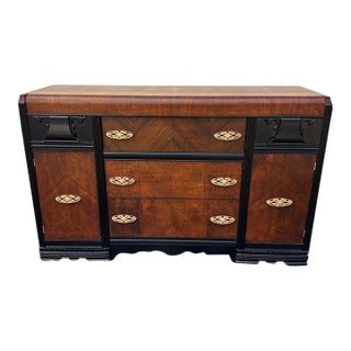 Vintage Art Deco Waterfall Sideboard or Buffet Featuring Burl Wood Veneers, Black-Painted Accents, and Ornate Brass Hardware For Sale