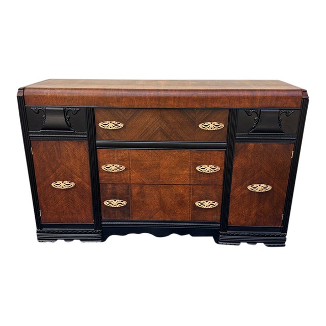Vintage Art Deco Waterfall Sideboard or Buffet Featuring Burl Wood Veneers, Black-Painted Accents, and Ornate Brass Hardware For Sale