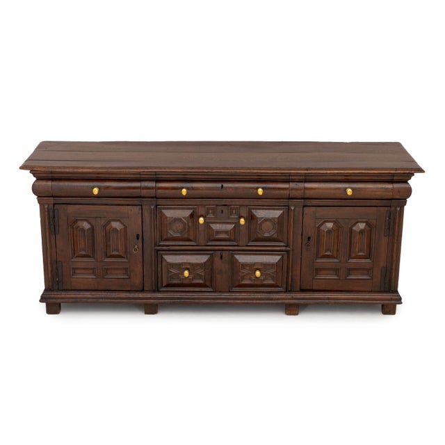 Renaissance Revival Oak Sideboard, three drawers above two central drawers flanked by two single door cabinet...