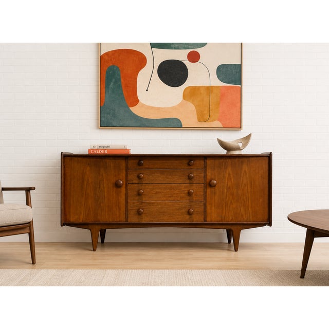 Mid Century Modern Teak Sideboard, beautifully crafted by renowned British furniture maker A. Younger Ltd.,c. 1960’s....