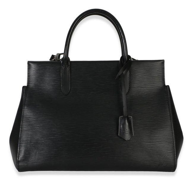 Item #: 154472 Interior Material: Microfiber Size: MM Features Interior: two gussets. Three slip pockets. One zip pocket...