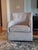 Katrina Velvet Dove Beige Fabric Swivel Glider Armchairs Set of 2 brings a refined, contemporary silhouette to compact...