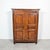 A rare and stately 18th century French Louis XVI period armoire, hand carved from walnut in the Limoges region of...